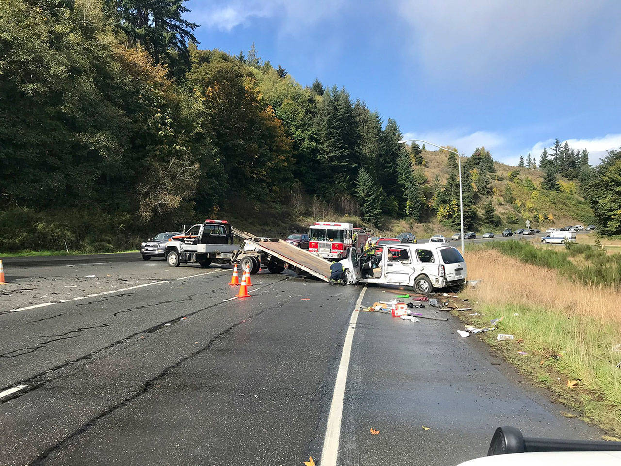 Washington State Patrol troopers clear the scene of a two-car injury collision on U.S. Highway 101 at Morse Creek in Port Angeles on Tuesday, Oct. 13, 2020. (Photo courtesy of Washington State Patrol)