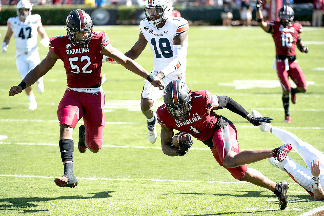 South Carolina defensive back Jaycee Horn (1) returns his second interception of the game during the second half of an NCAA college football game Saturday, Oct. 17, 2020, in Columbia, S.C. South Carolina defeated Auburn 30-22. (AP Photo/Sean Rayford)