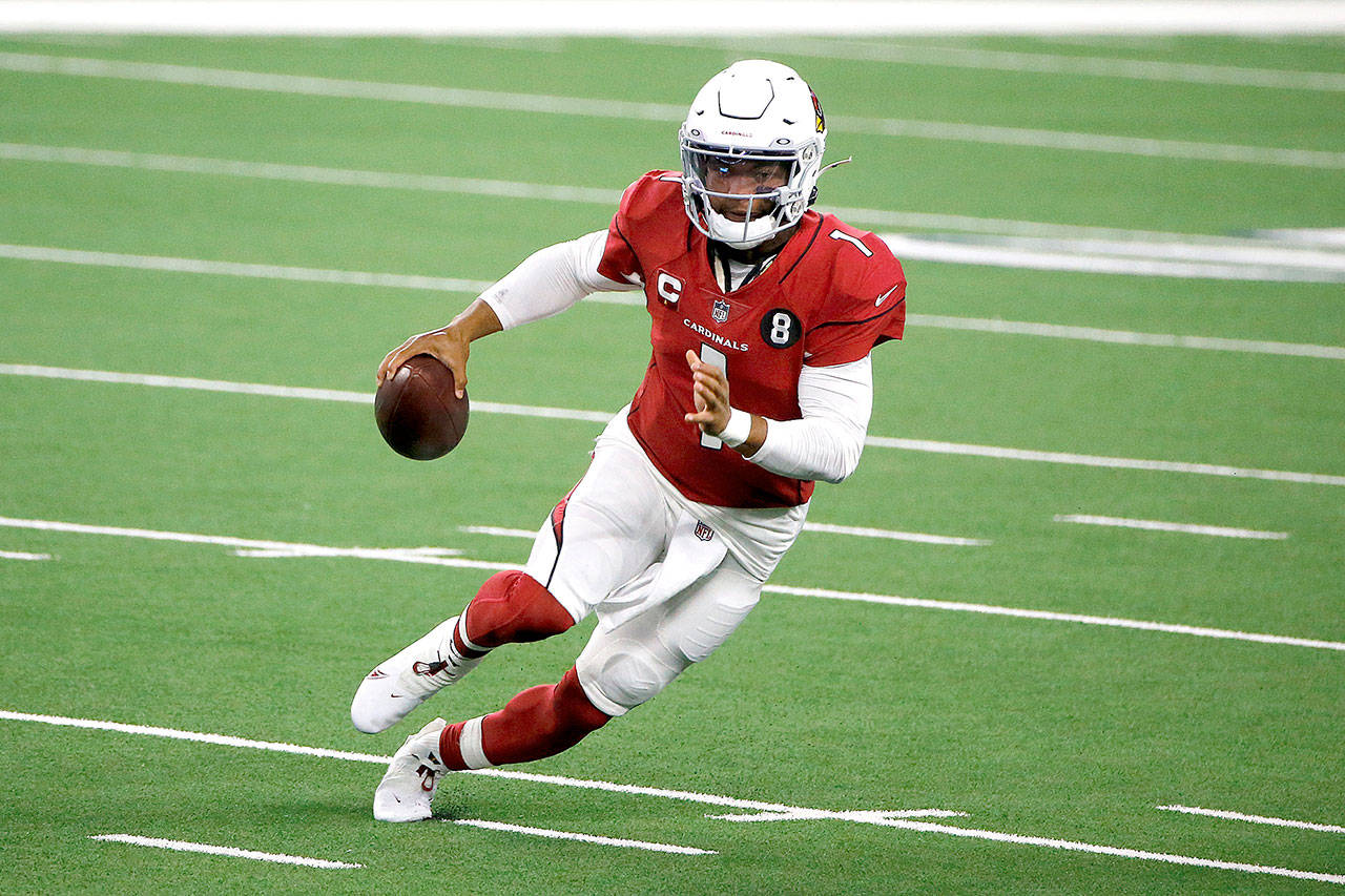 Arizona Cardinals quarterback Kyler Murray (1) looks to throw during an NFL Football game in Arlington, Texas, Monday, Oct. 19, 2020. (AP Photo/Michael Ainsworth)