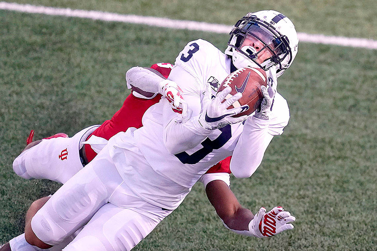 Penn State's Parker Washington (3) tries to make a catch while being defended by Indiana's Tiawan Mullen (3) during the second half of an NCAA college football game, Saturday, Oct. 24, 2020, in Bloomington, Ind. Indiana won 36-35 in overtime. Mullen was called for pass interference. (AP Photo/Darron Cummings)