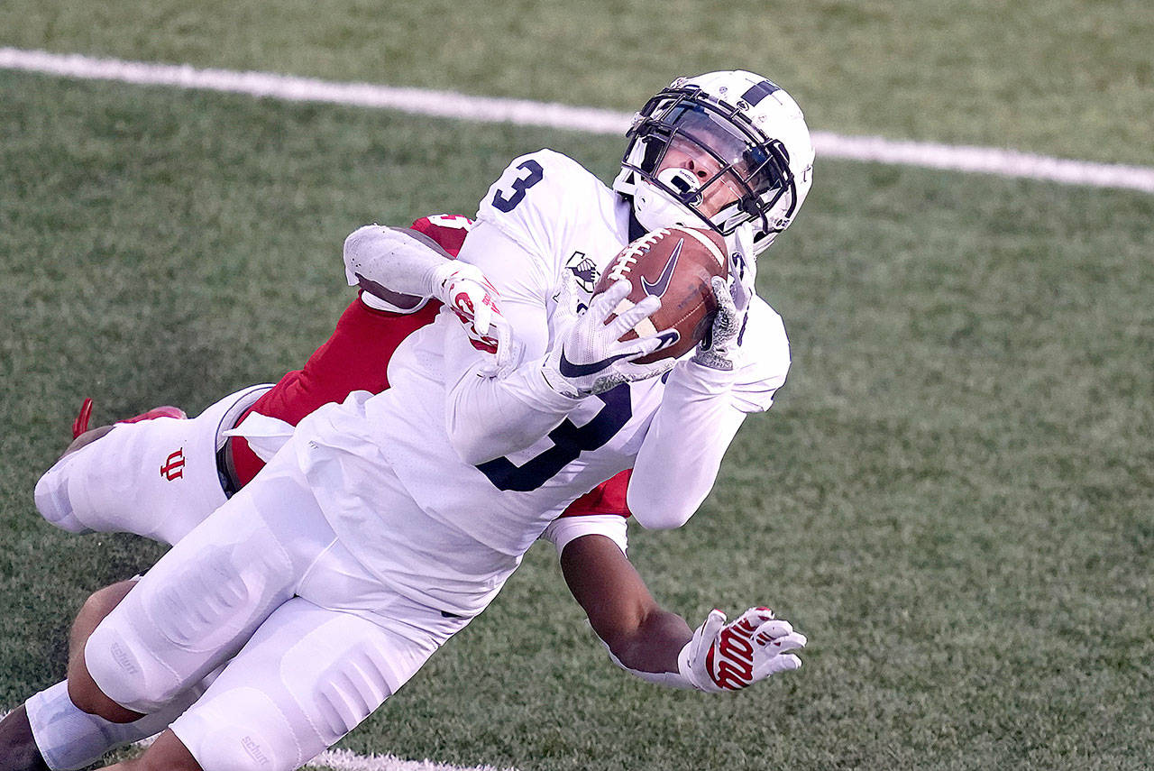 Penn State’s Parker Washington (3) tries to make a catch while being defended by Indiana’s Tiawan Mullen (3) during the second half of an NCAA college football game, Saturday, Oct. 24, 2020, in Bloomington, Ind. Indiana won 36-35 in overtime. Mullen was called for pass interference. (AP Photo/Darron Cummings)