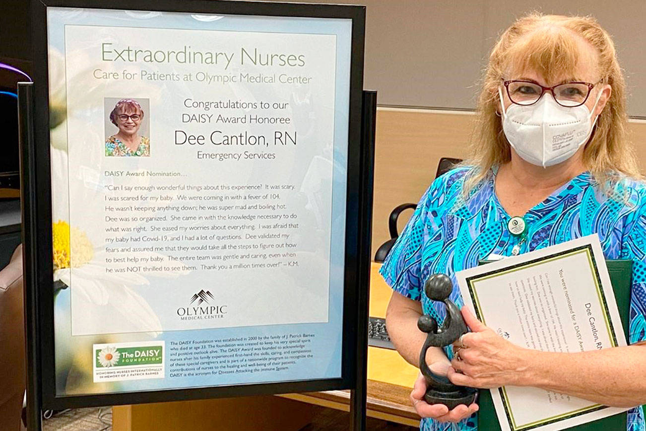 Dolores ‘Dee’ Cantlon, RN, receives a DAISY Award for exceptional nursing at Olympic Medical Center.