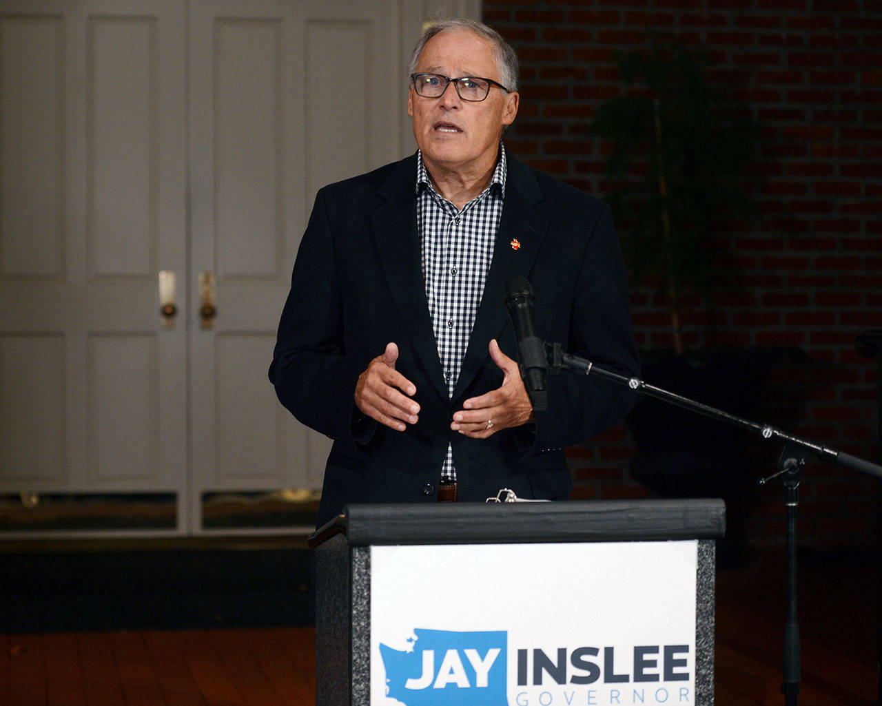 Gov. Jay Inslee thanks the voters of Washington state after winning his third term Tuesday, Nov. 3, 2020 in Olympia. (Steve Bloom/The Olympian via AP)