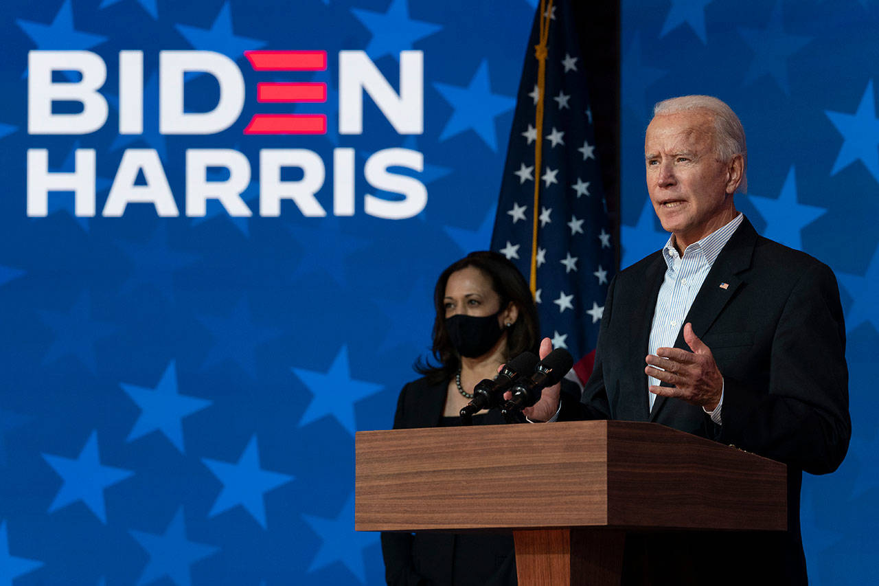 Democratic presidential candidate former Vice President Joe Biden joined by Democratic vice presidential candidate Sen. Kamala Harris, D-Calif., speaks at the The Queen theater Thursday, Nov. 5, 2020, in Wilmington, Del. (Carolyn Kaster/Associated Press)