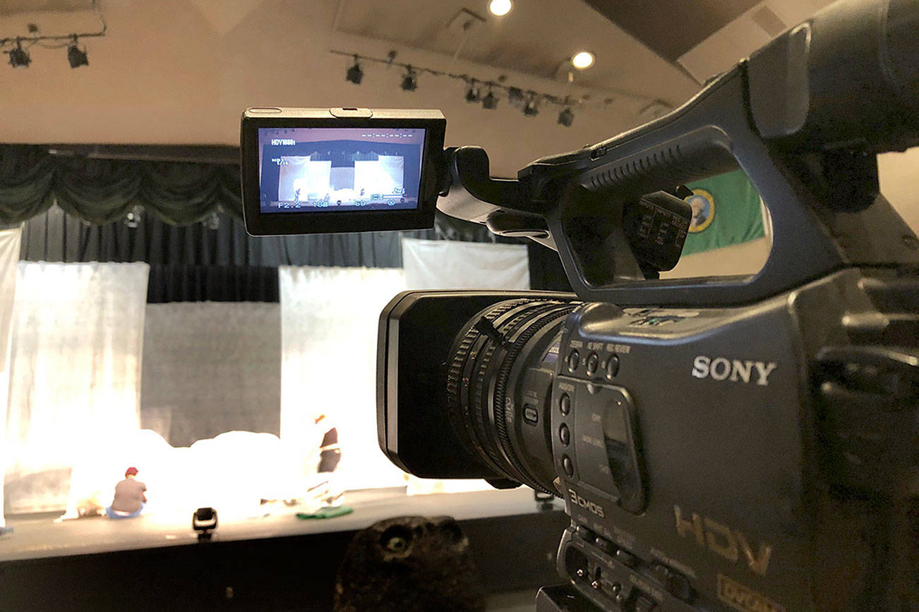 A camera catches the action on the stage for an online rendition of a Port Angeles High School play.