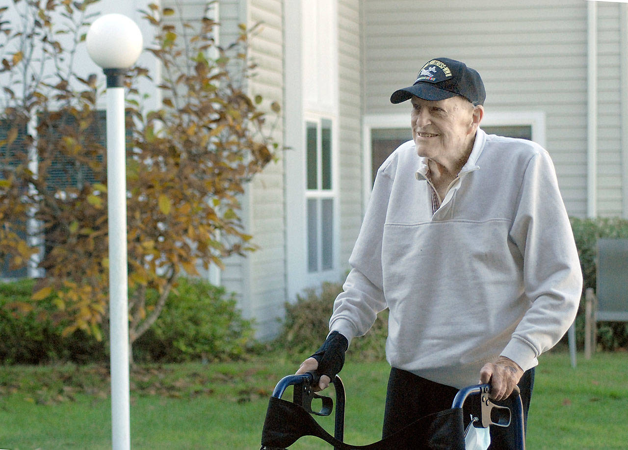 Larry Owen, 97, stands outside St. Andrew’s Place Assisted Living Community in Port Angeles on Friday, Nov. 6, 2020. (Keith Thorpe/Peninsula Daily News)