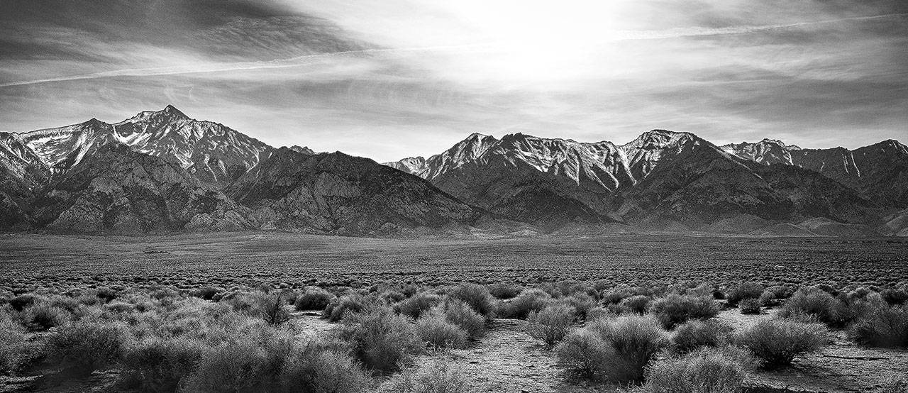Brian Goodman’s “Desolate Surroundings” depicts the site of the Manzanar camp in the Owens Valley of California.