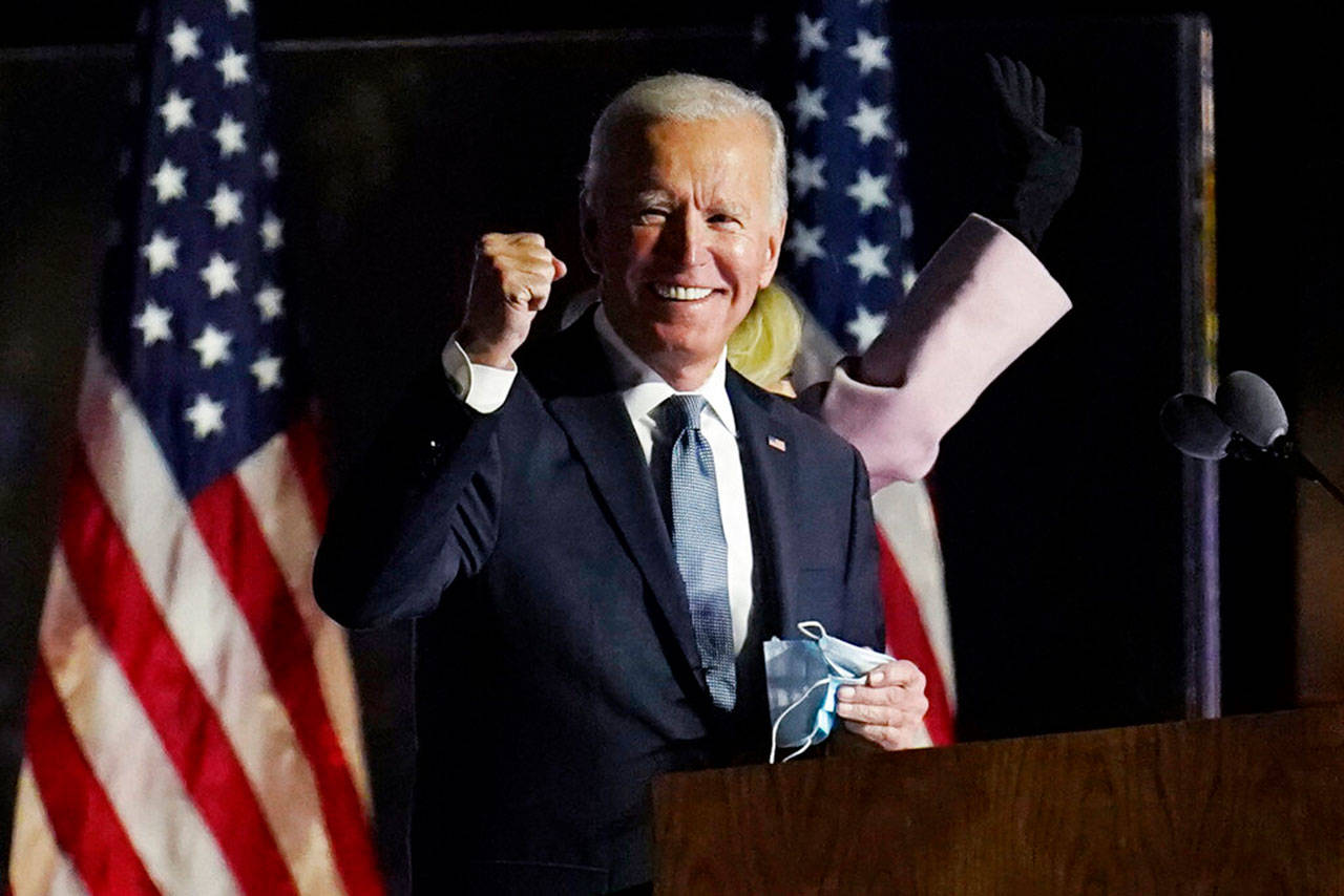 Joe Biden speaks to supporters early Wednesday, Nov. 4, 2020, in Wilmington, Del. Democrat Biden defeated President Donald Trump to become the 46th president of the United States on Saturday, Nov. 7, 2020. (Paul Sancya/Associated Press)