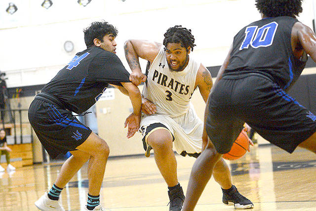 Peninsula College’s Davien Harris-Williams drives against Edmonds in January 2020. Peninsula College student-athletes gained a eligibility waiver for this season because of the effects of the COVID-19 pandemic on the NWAC’s sports seasons. (Peninsula Daily News files)