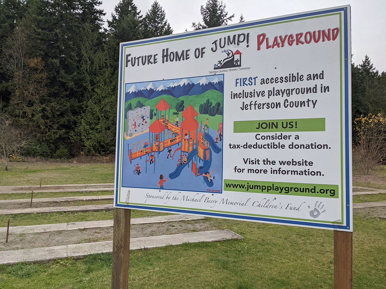 HJ Carroll Park currently displays a large sign with the plans for the Jefferson Universal Movement Playground to be built next to the basketball courts to better serve all members of the community. (Zach Jablonski/Peninsula Daily News)