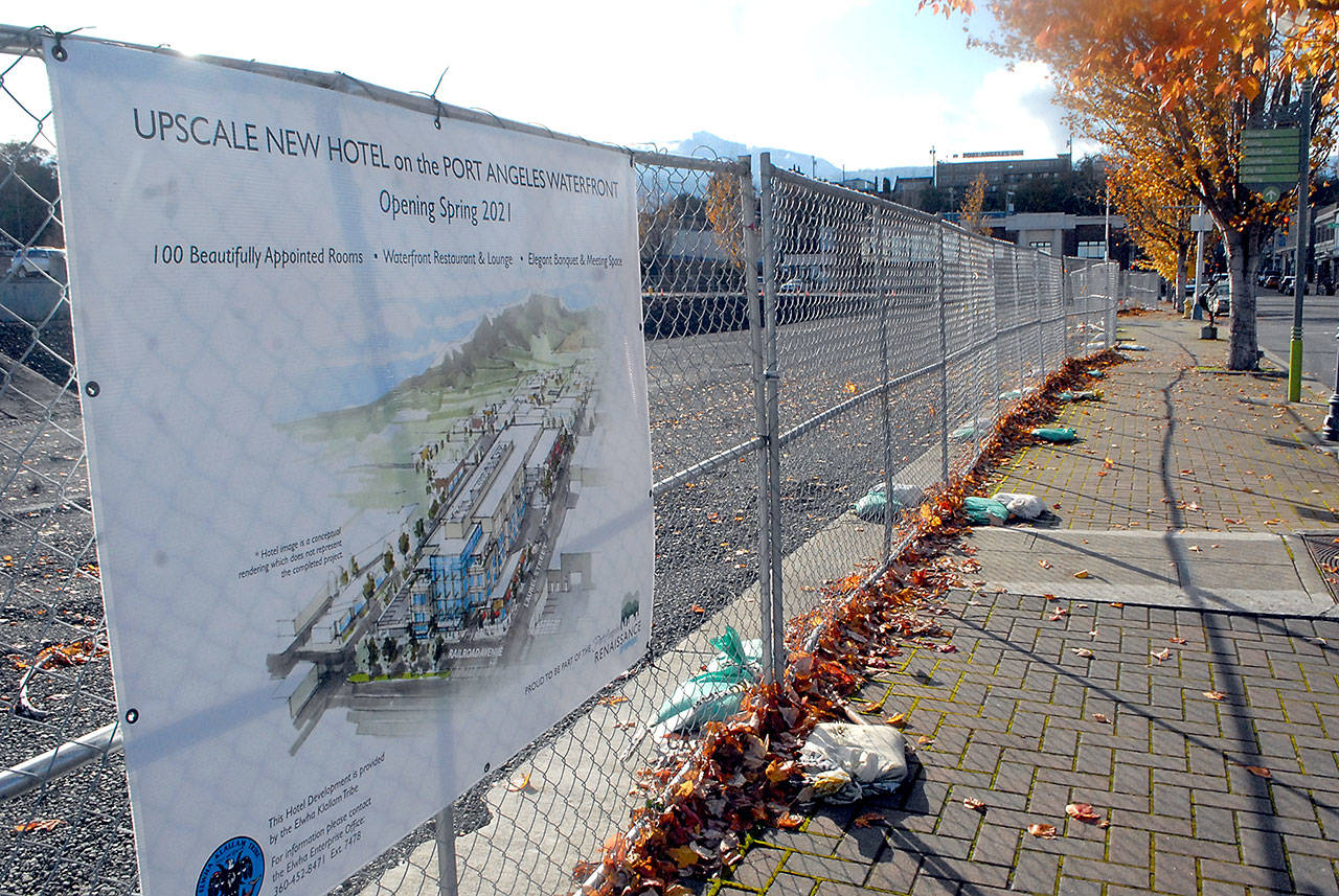 Construction fencing surrounds the site of a luxury hotel being built by the Lower Elwha Klallam Tribe at Front and Laurel streets in downtown Port Angeles. (Keith Thorpe/Peninsula Daily News)