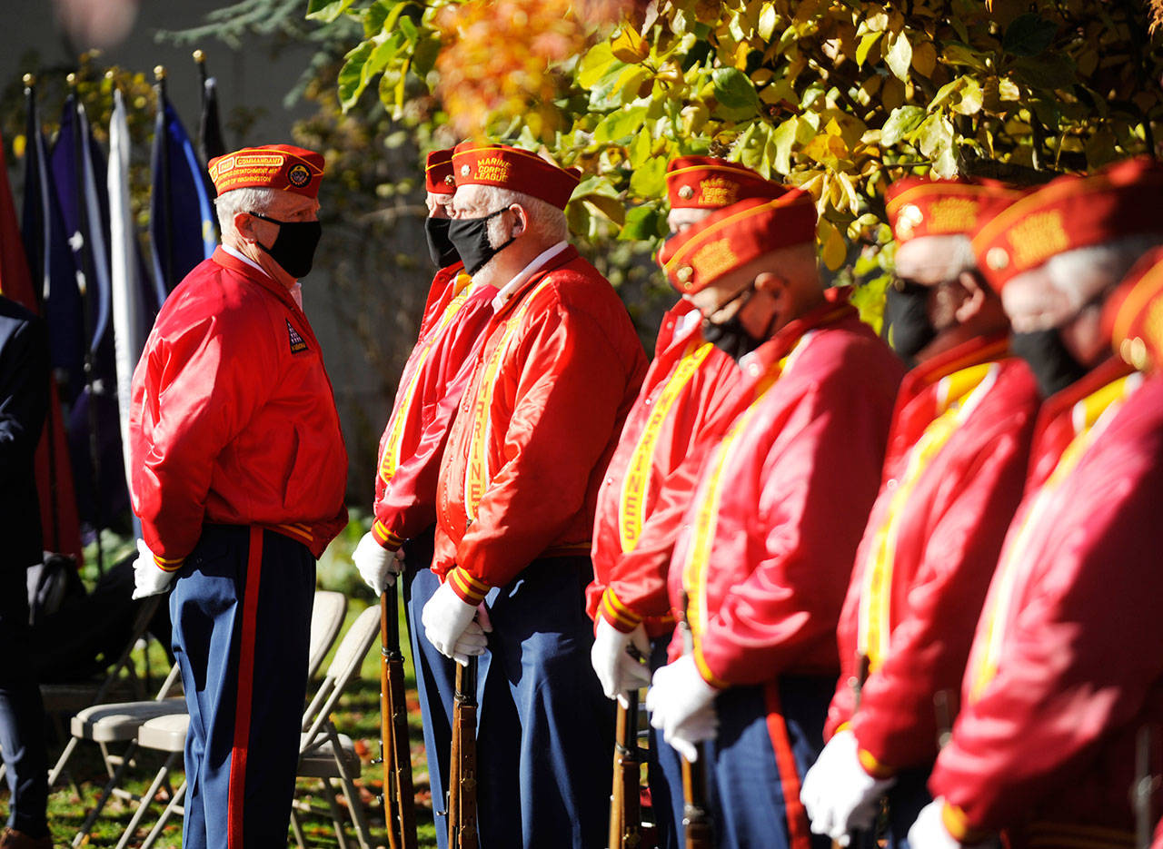 Members of the Marine Corps League’s Mt. Olympus Detachment help celebrate veterans during a special ceremony at Sequim’s Pioneer Memorial Park on Wednesday. (Michael Dashiell/Olympic Peninsula News Group)