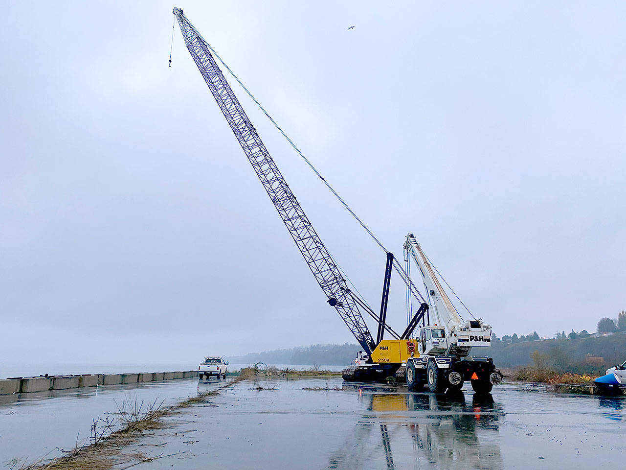 A crane was staged by Rayonier Advanced Materials Inc. last week at the former Rayonier pulp mill site in Port Angeles, where it will begin removing deck panels from a giant pier. (Rayonier Advanced Materials Inc.)