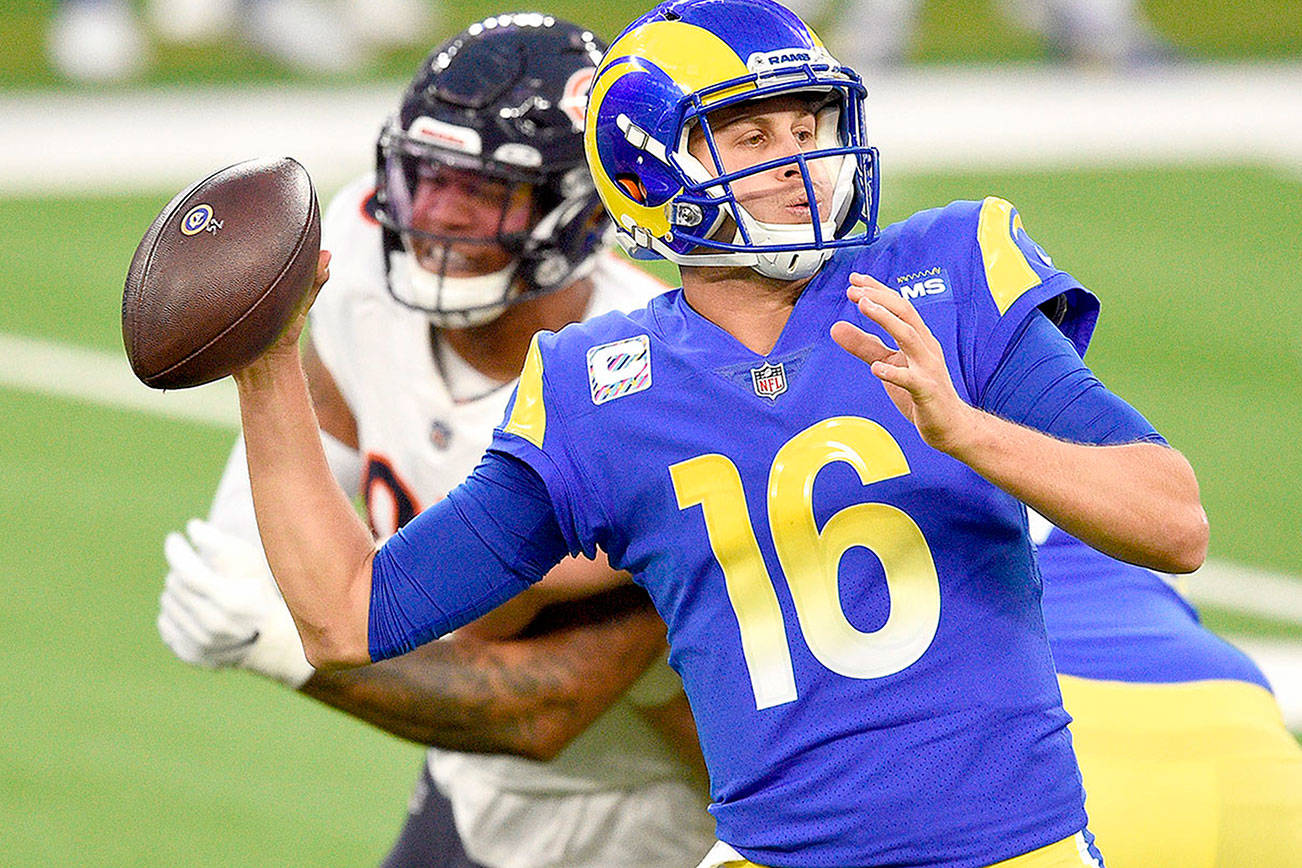 Los Angeles Rams quarterback Jared Goff (16) throws against the Chicago Bears during the first half of an NFL football game Monday, Oct. 26, 2020, in Inglewood, Calif. (AP Photo/Kelvin Kuo)