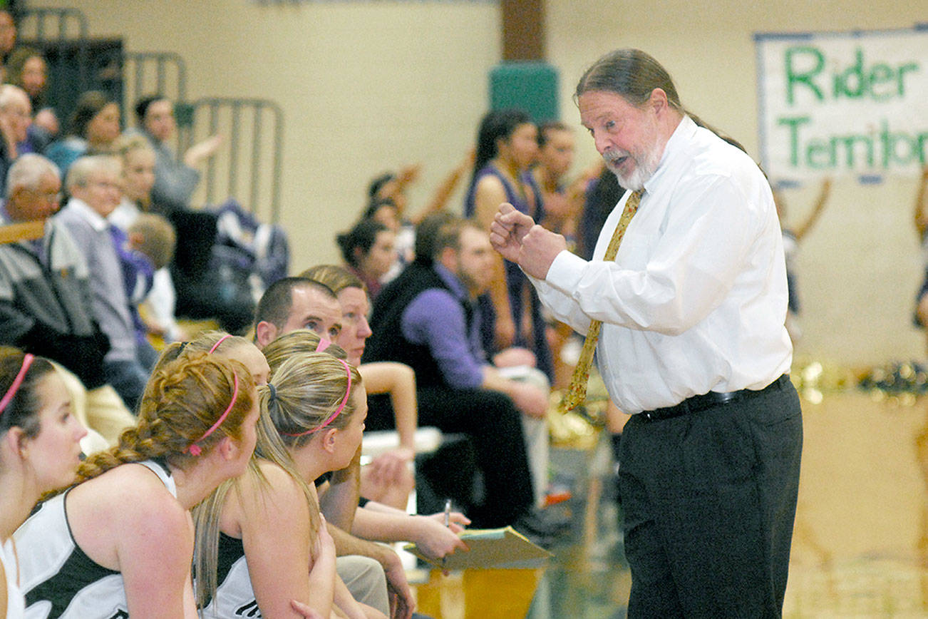 Keith Thorpe/Peninsula Daily News
Michael Poindexter was rehired as the Port Angeles girls basketball coach. Poindexter was forced to resign his position when he retired as a teacher in June and had to reapply for the open position. Poindexter has a record of 158-70 for the Roughriders with six league championships and two district championships.