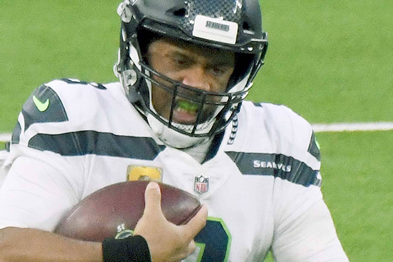 Seattle Seahawks quarterback Russell Wilson (3) scrambles against the Los Angeles Rams in the fourth quarter of an NFL football game in Inglewood, Calif., Sunday, Nov. 15, 2020. (Keith Birmingham/The Orange County Register via AP)