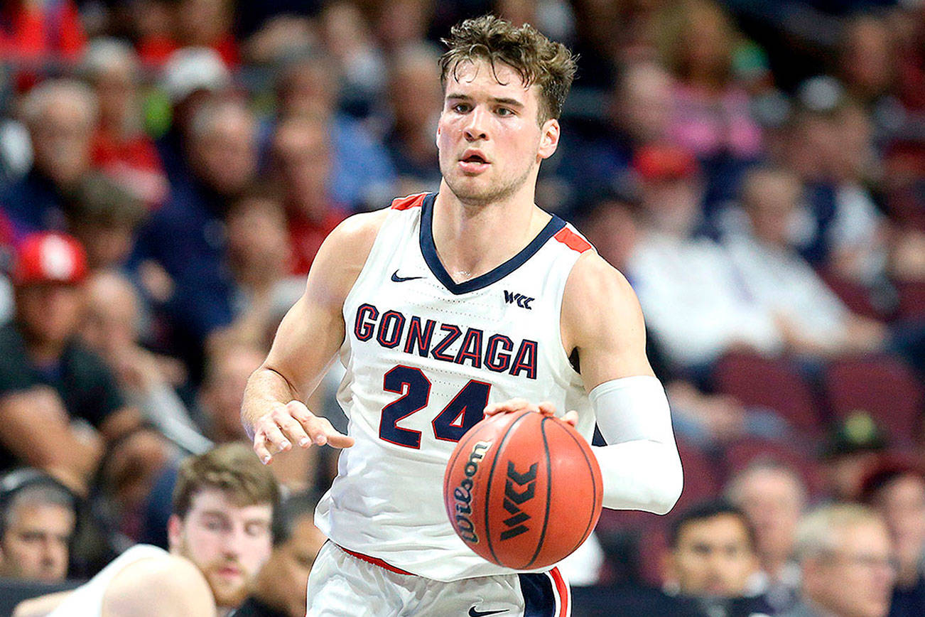 FILE - In this March 9, 2020, file photo, Gonzaga's Corey Kispert plays against San Francisco during the first half of an NCAA college basketball game in the West Coast Conference men's tournament in Las Vegas. Kispert has made The Associated Press 2020-21 preseason All-America team, announced Wednesday, Nov. 11. (AP Photo/Isaac Brekken, File)