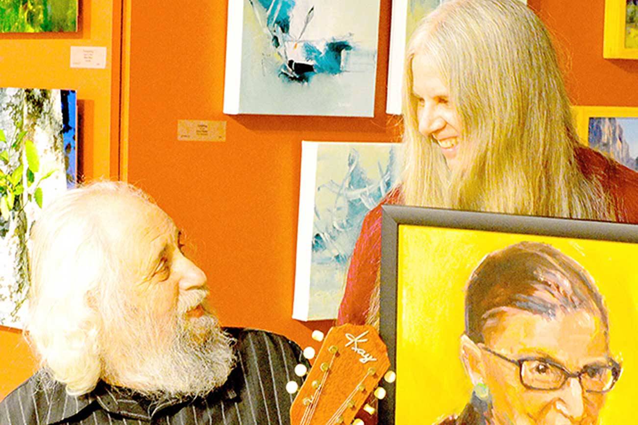 Mandolinist David Grisman and painter Tracy Bigelow Grisman, seen here with their donations, are among the contributors to "Weave It Together," the Northwind Arts Center-Port Townsend School of the Arts auction online now. (Diane Urbani de la Paz/Peninsula Daily News)