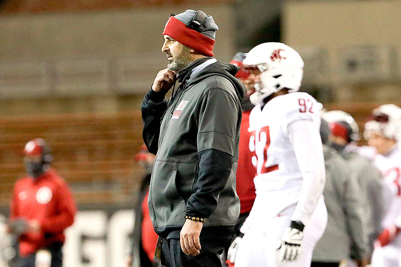 Washington State head coach Nick Rolovich looks on as officials deliberate during an NCAA college football game against Oregon State in Corvallis, Ore., Saturday, Nov. 7, 2020. Washington State won 38-28. (AP Photo/Amanda Loman)