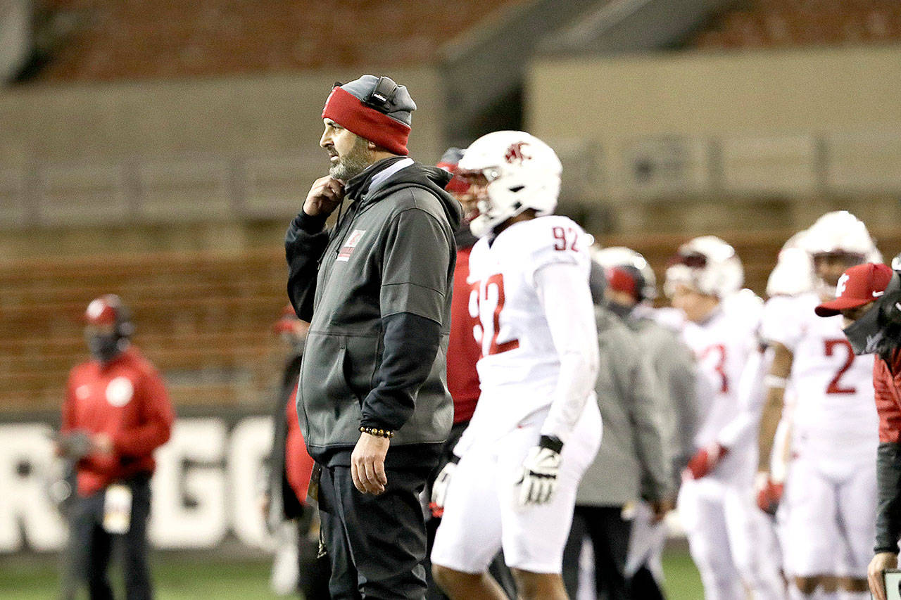 Washington State head coach Nick Rolovich looks on as officials deliberate during an NCAA college football game against Oregon State in Corvallis, Ore., on Saturday, Nov. 7, 2020. Washington State won 38-28. (Amanda Loman/The Associated Press)