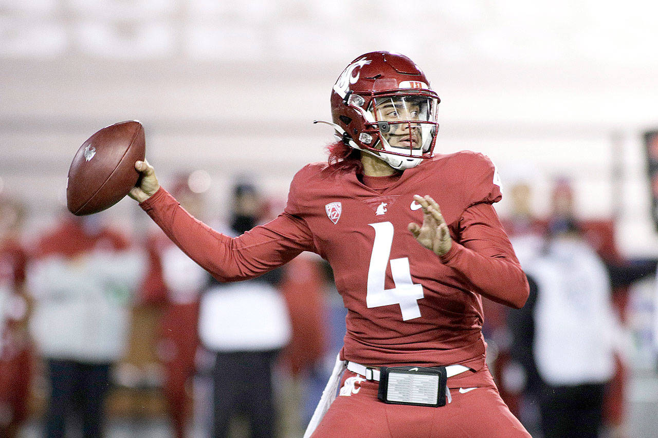 Washington State quarterback Jayden de Laura (4) throws a pass during the second half of the team’s NCAA college football game against Oregon in Pullman, Wash., Saturday, Nov. 14, 2020. Oregon won 43-29. (Young Kwak/Associated Press)