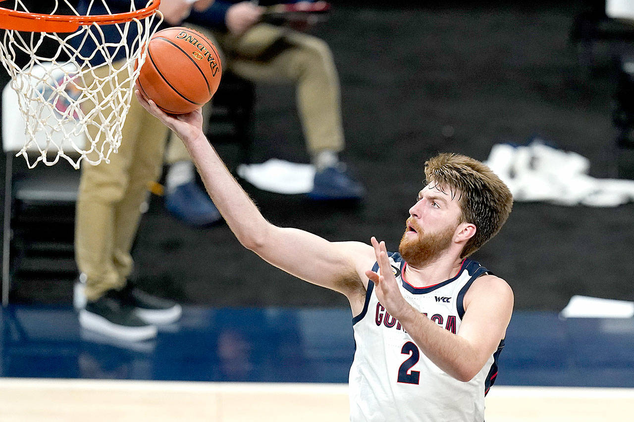 Gonzaga’s Drew Timme goes to the basket during the second half of the team’s NCAA college basketball game against West Virginia on Wednesday, Dec. 2, 2020, in Indianapolis. (Darron Cummings/Associated Press)