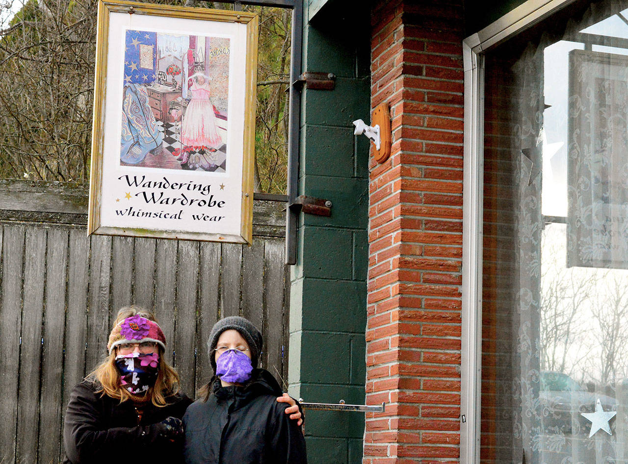 Beverly Michaelsen, left, and her daughter Kaiya Lily Hubbard are still consigning and selling vintage wear at the Wandering Wardrobe even as they hope for a buyer. (Diane Urbani de la Paz/Peninsula Daily News)