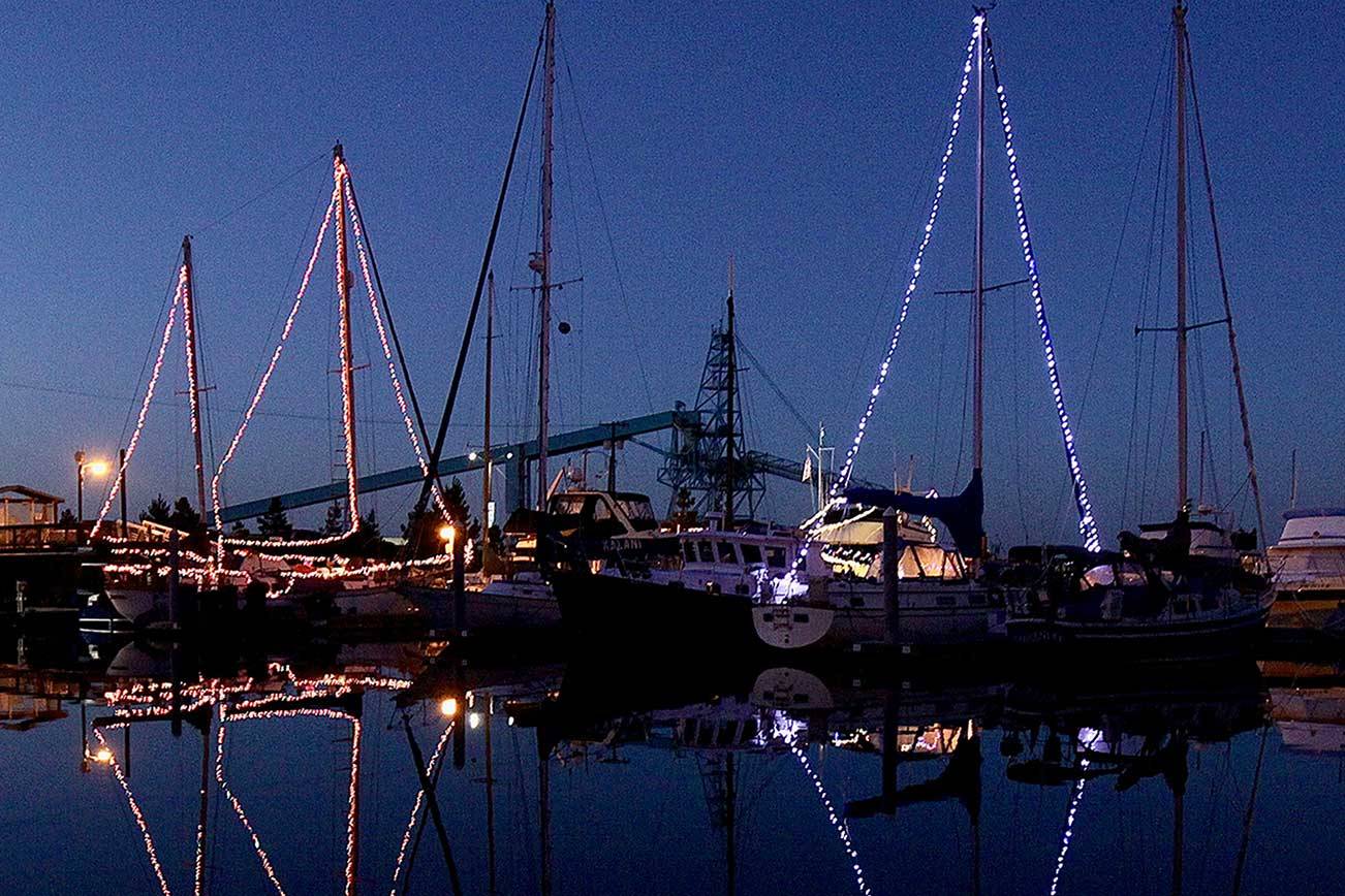 Dave Logan/for Peninsula Daily News 

Many boats in the Port Angeles Boat Haven are decked out with Christmas lights, and calm water makes for great reflections. Voting was conducted last week among members of the Port Angeles Yacht Club for its lighted-boat contest for 2020. “Sirens Song” was voted the best decorated sailboat. “Gold Rush” was voted tops among decorated motored craft.