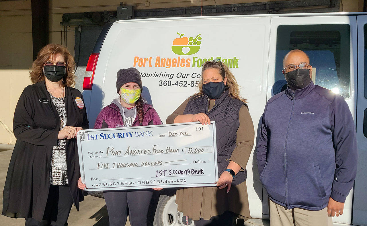 Pictured, from left to right, are Elisa Simonsen, 1st Security Bank branch manager; Annabelle Chesney-Lucero, Port Angeles Food Bank community engagement coordinator; Emily Dexter, Port Angeles Food Bank director; and Darrell Jenkins, 1st Security Bank business relationship manager. (Submitted photo)