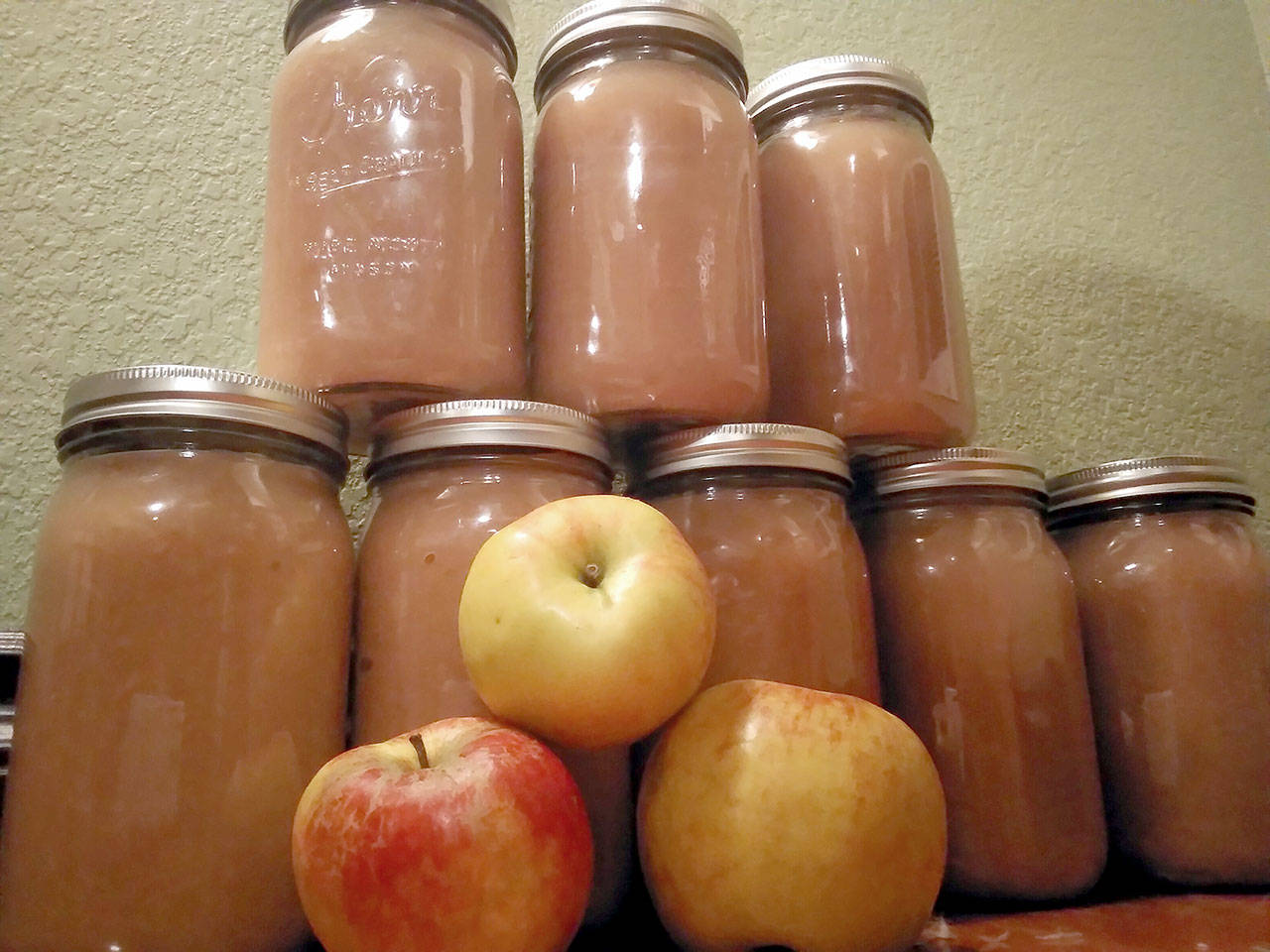 Sugar-free applesauce and apples — gleaned and given away by Sequim and Port Angeles volunteers — are helping local families through the winter. (Photo courtesy of Sharah Truett/WSU Clallam County Extension)