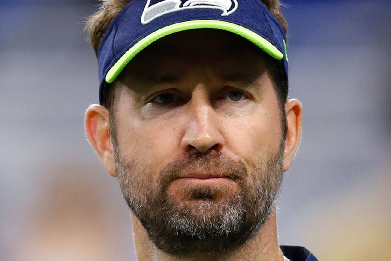 In this Oct. 28, 2018, file photo, Seattle Seahawks offensive coordinator Brian Schottenheimer watches the team's NFL football game against the Detroit Lions in Detroit. The Seahawks fired Schottenheimer on Tuesday, Jan. 12, 2021, following a season in which the team set several offensive records but coach Pete Carroll had clear issues with how the offense operated. (Paul Sancya/The Associated Press)