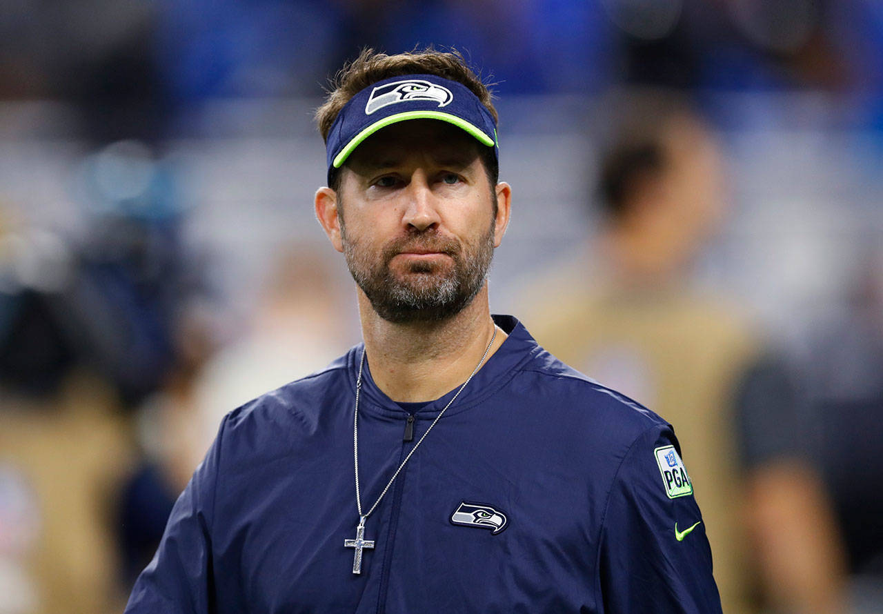 In this Oct. 28, 2018, file photo, Seattle Seahawks offensive coordinator Brian Schottenheimer watches the team’s NFL football game against the Detroit Lions in Detroit. The Seahawks fired Schottenheimer on Tuesday, Jan. 12, 2021, following a season in which the team set several offensive records but coach Pete Carroll had clear issues with how the offense operated. (Paul Sancya/The Associated Press)
