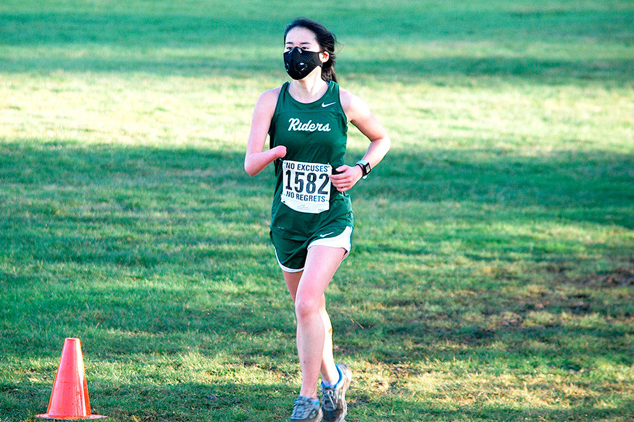 Port Angeles High School
Port Angeles senior cross country runner Kathryn Guttormsen competes at Klahowya on Saturday. It was the first prep sports competition since the COVID-19 pandemic shut down all prep sports last March.