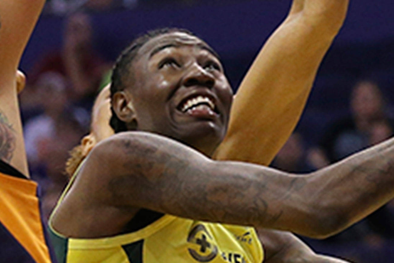 Seattle Storm forward Natasha Howard, right, drives past Phoenix Mercury center Brittney Griner (42) during the first half of a WNBA basketball game in Phoenix on Sept. 3, 2019. The New York Liberty acquired Natasha Howard from the Seattle Storm as part of a three-team trade on Wednesday. (Ross D. Franklin/The Associated Press file photo)