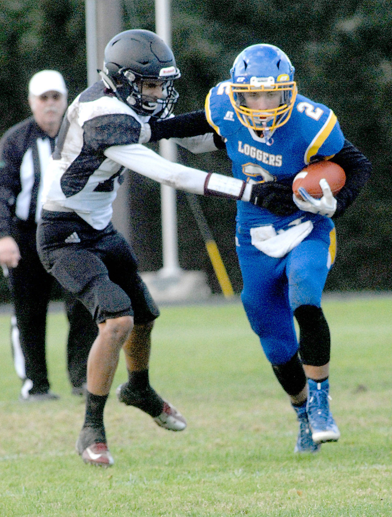 Crescent’s Brenten Dalton, right, tries to evade Lummi Nation’s Jaie Leighton during Satuday’s matchup in Joyce. (Keith Thorpe/Peninsula Daily News)