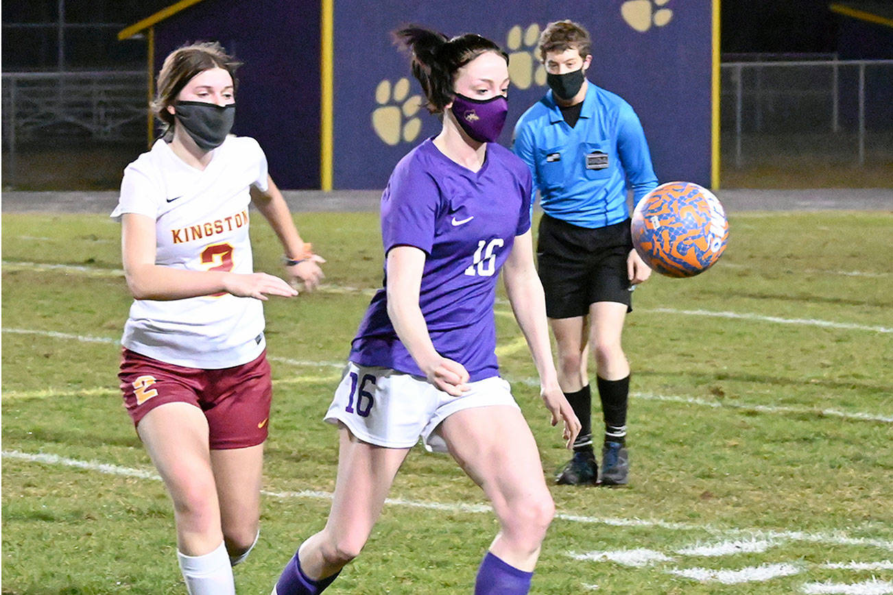 Michael Dashiell/Olympic Peninsula News Group
Sequim midfielder Abby Schroeder, center, vies with Kingston Buccaneer Mandy Dormaier as they chase down a ball in the first half of Sequim's 2-1 win over Kingston on Feb. 18.