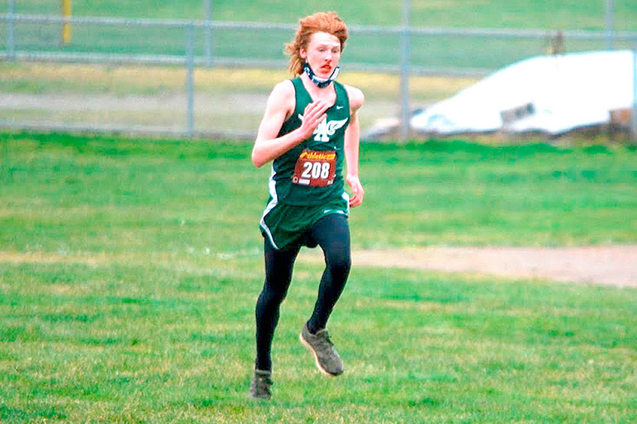 Port Angeles' Jack Gladfelter races in Saturday's dual meet again Sequim on Saturday at Kingston. Gladfelter won the boys' race.