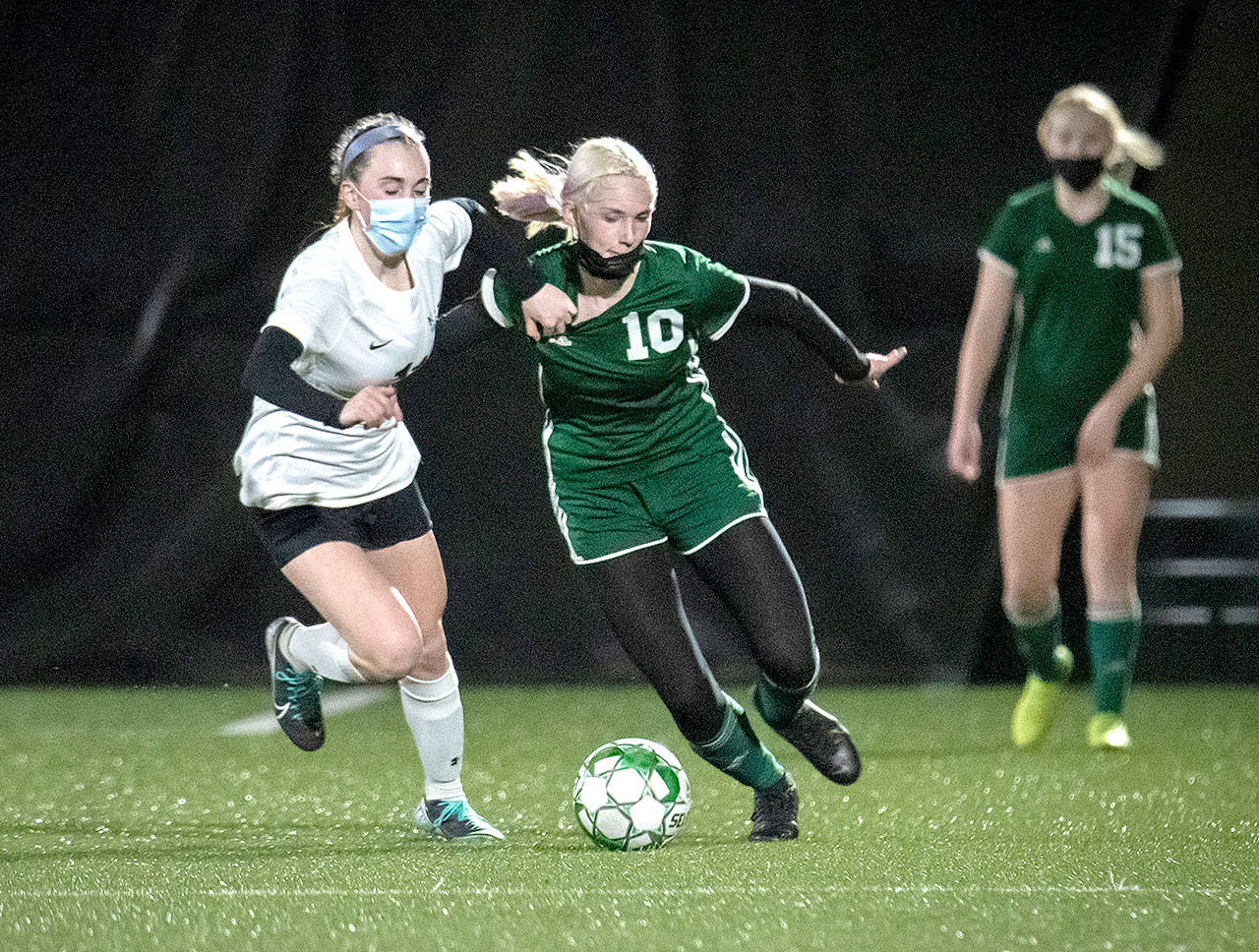 Jesse Major/for Peninsula Daily News Port Angeles’ Millie Long (10) had two goals for the Roughriders Tuesday night against Klahowya in a 3-1 win over a strong team. In the background is the Riders’ Paige Mason (15).