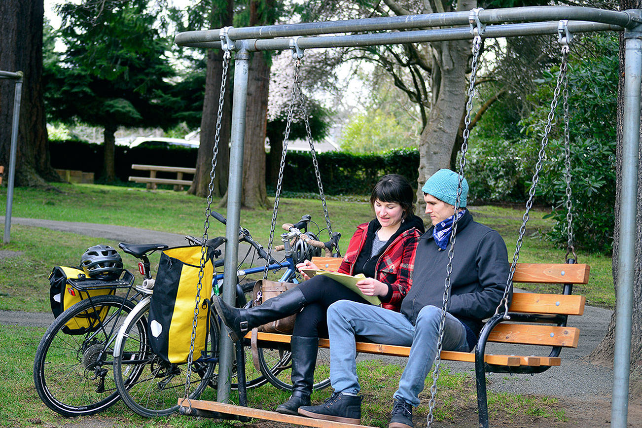 Sophie Elan and Mark Katsikapes enjoy Tuesday afternoon at Port Townsend's Chetzemoka Park, which has received a $127,000 bequest from a Sequim woman who loved the spacious park. (Diane Urbani de la Paz/Peninsula Daily News)
