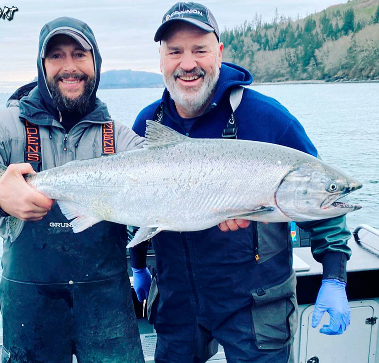Joey Pyburn, left, and Tom Nelson, the host of 710 AM ESPN Seattle’s The Outdoor Line radio show, display a 17.5-pound blackmouth chinook caught while fishing out of Mason’s Resort in Sekiu. The blackmouth chinook fishery will run through April 30 in Marine Area 5. Neighboring Marine Area 6 (Eastern Strait of Juan de Fuca) and 9 (Admiralty Inlet) will not open for blackmouth fisheries this year. (Mason’s Resort)