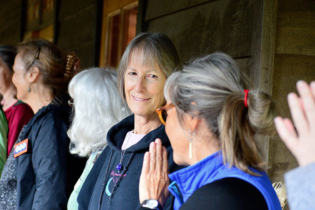 Womanfest board member Barbara Wise talks with the fall retreat participants at Lake Crescent in 2016. The retreat will return this September, organizers hope. Diane Urbani de la Paz/Peninsula Daily News