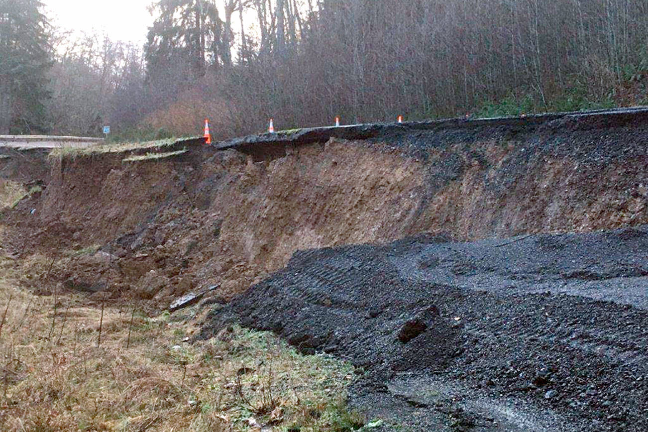 Photo courtesy of WSDOT
 State Highway 112 at milepost 36.9, where the highway has dropped more than 13 feet due to roadway settlement.