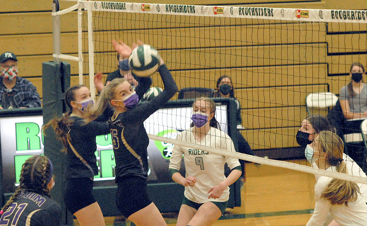 Sequim’s Amanda Weller and Kendall Hastings, at the net, look to teammate Kalli Wiker, lower left, for assistance as Port Angeles’ Samantha Robbins, Ava Brenkman and Lillian Halberg look on during Saturday’s match at Port Angeles High School. (Keith Thorpe/Peninsula Daily News)