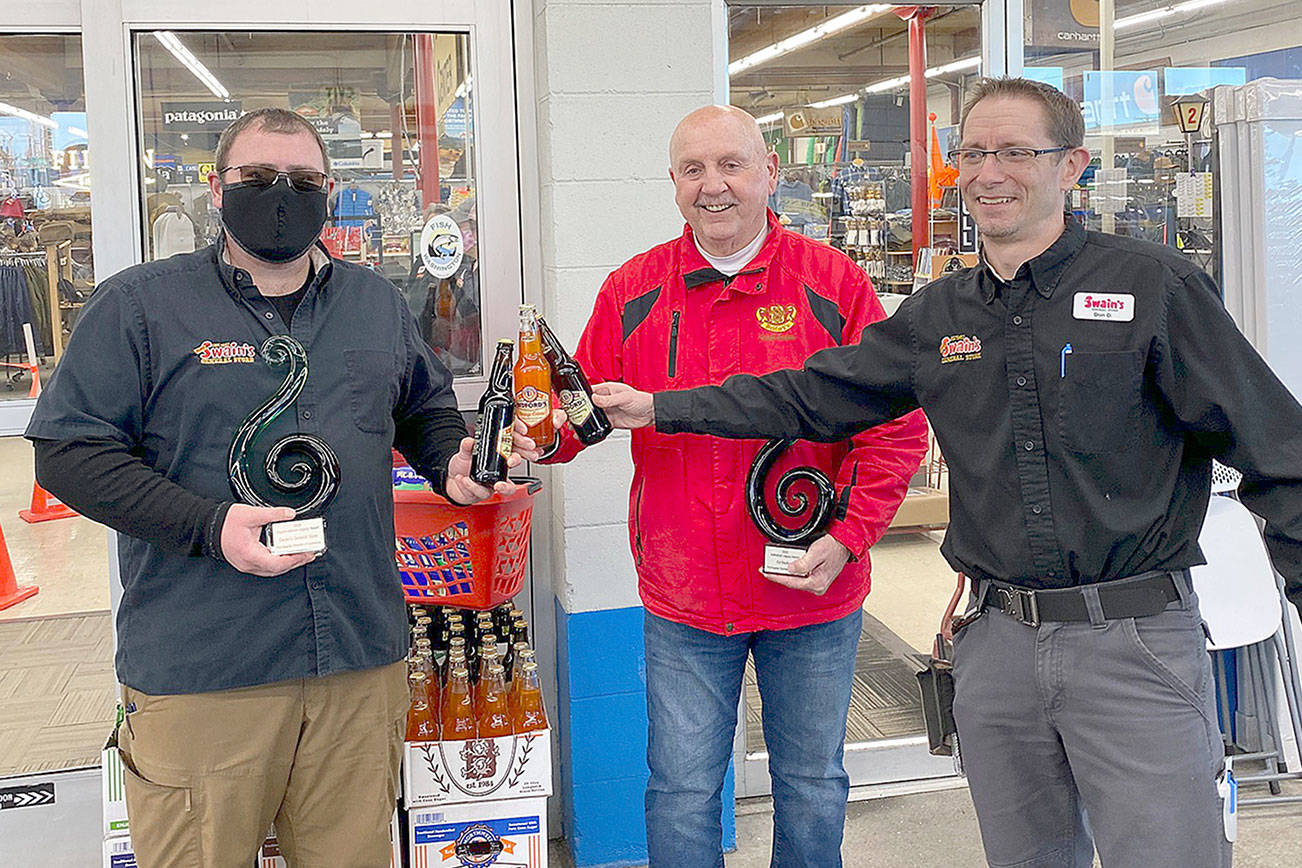RCheers to winners 

Toasting each other with Bedford’s Sodas are, from left, Ryan Gedlund of Swain’s General Store, Ed Bedford, creator of Bedford’s Sodas and Don Droz of Swain’s after Swain’s and Bedford were presented with the 2021 Legacy Awards. Not pictured is Tim Tucker, Port Angeles Chamber of Commerce president, who presented the awards. The Port Angeles Chamber of Commerce Legacy Awards began in 2020 and are awarded to an organization and an individual who have built impressive and positive legacies for our community, said Marc Abshire, chamber executive director. Last year’s winners were Black Ball Ferry Line and, posthumously, Jim Moran.