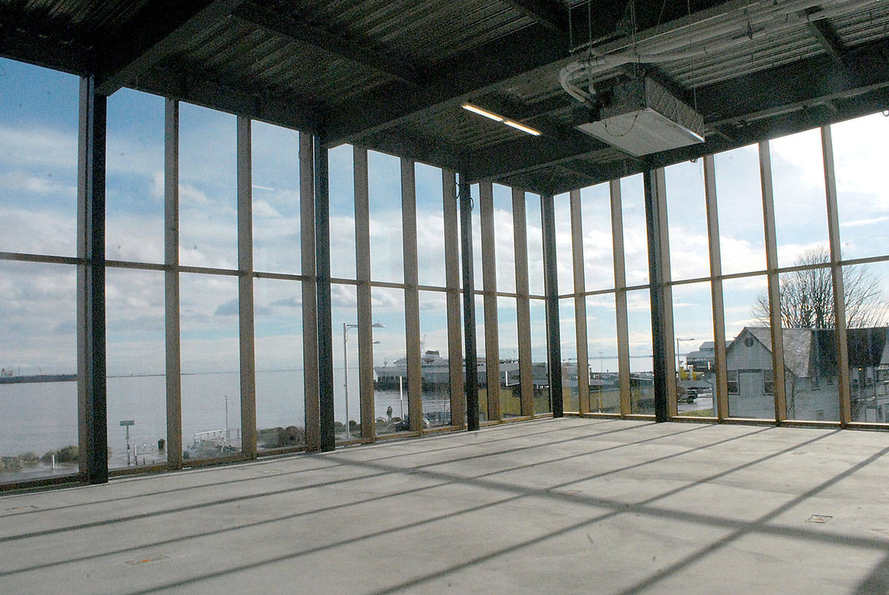 A wall of windows surrounds a conference area, offering commanding views of Port Angeles Harbor. (Keith Thorpe/Peninsula Daily News)