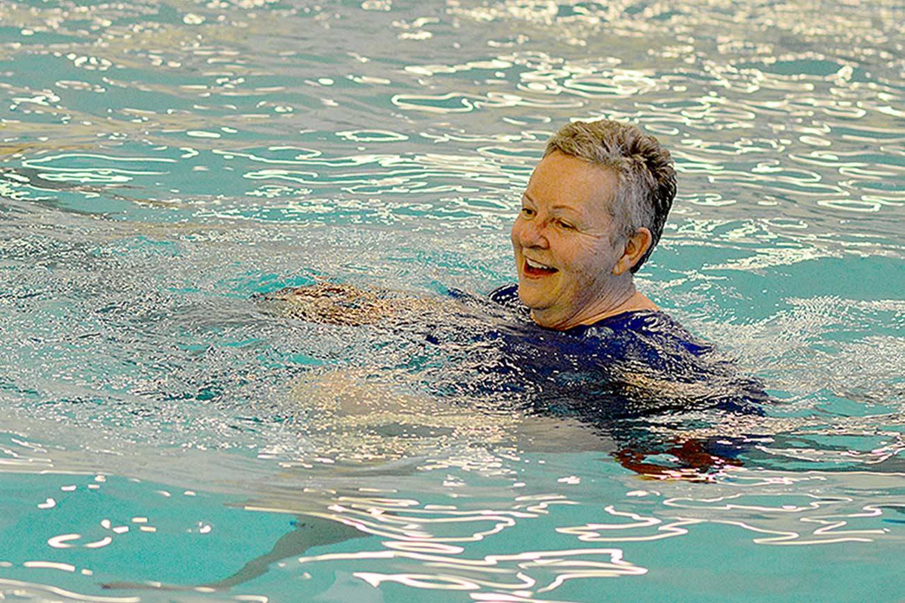 Houlton Madinger of Port Townsend is among the first to enjoy the Mountain View Pool’s 84-degree water Monday morning. The city pool, at 1925 Blaine St., has reopened for lap swimming and independent water aerobics — by reservation — from 7 a.m. to 11 a.m. Monday through Friday. For more information, visit cityofpt.us/pool or phone 360-385-POOL (7665). (Diane Urbani de la Paz/Peninsula Daily News)