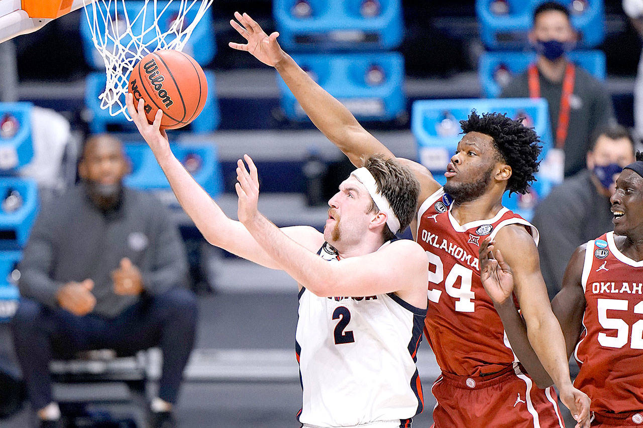 Gonzaga forward Drew Timme (2) shoots under Oklahoma guard Elijah Harkless (24) in the second half of a college basketball game in the second round of the NCAA tournament at Hinkle Fieldhouse in Indianapolis, Monday, March 22, 2021. (AP Photo/AJ Mast)