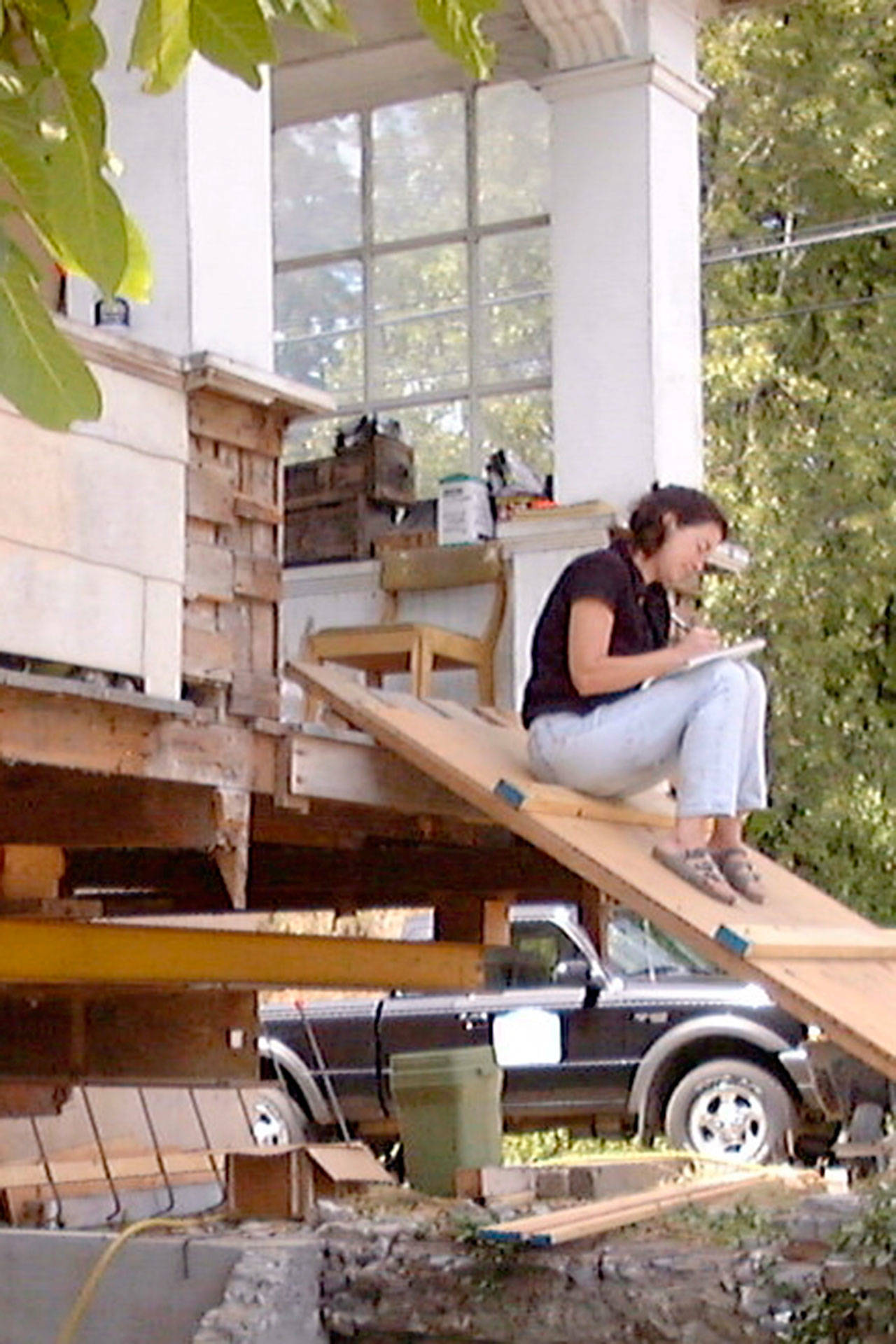 Erica Bauermeister, seen in August 2001 while renovating her house, will give a talk online tonight about her book, “House Lessons: Renovating a Life.” (Photo courtesy of Ben Bauermeister)