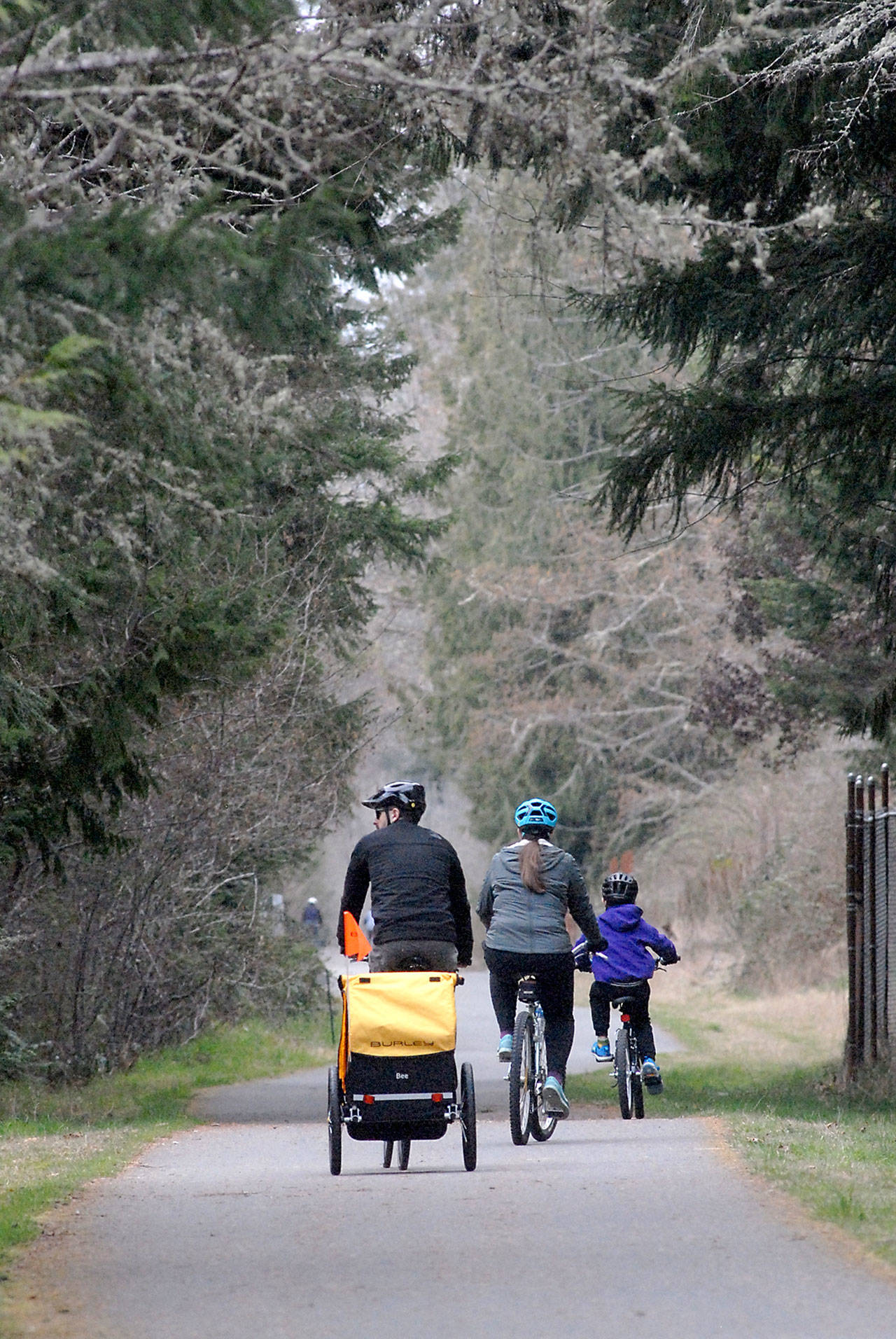 A group of bicyclists make their way down a section of the Olympic Discovery Trail near William R. Fairchild International Airport on the west side of Port Angeles. (Keith Thorpe/Peninsula Daily News)