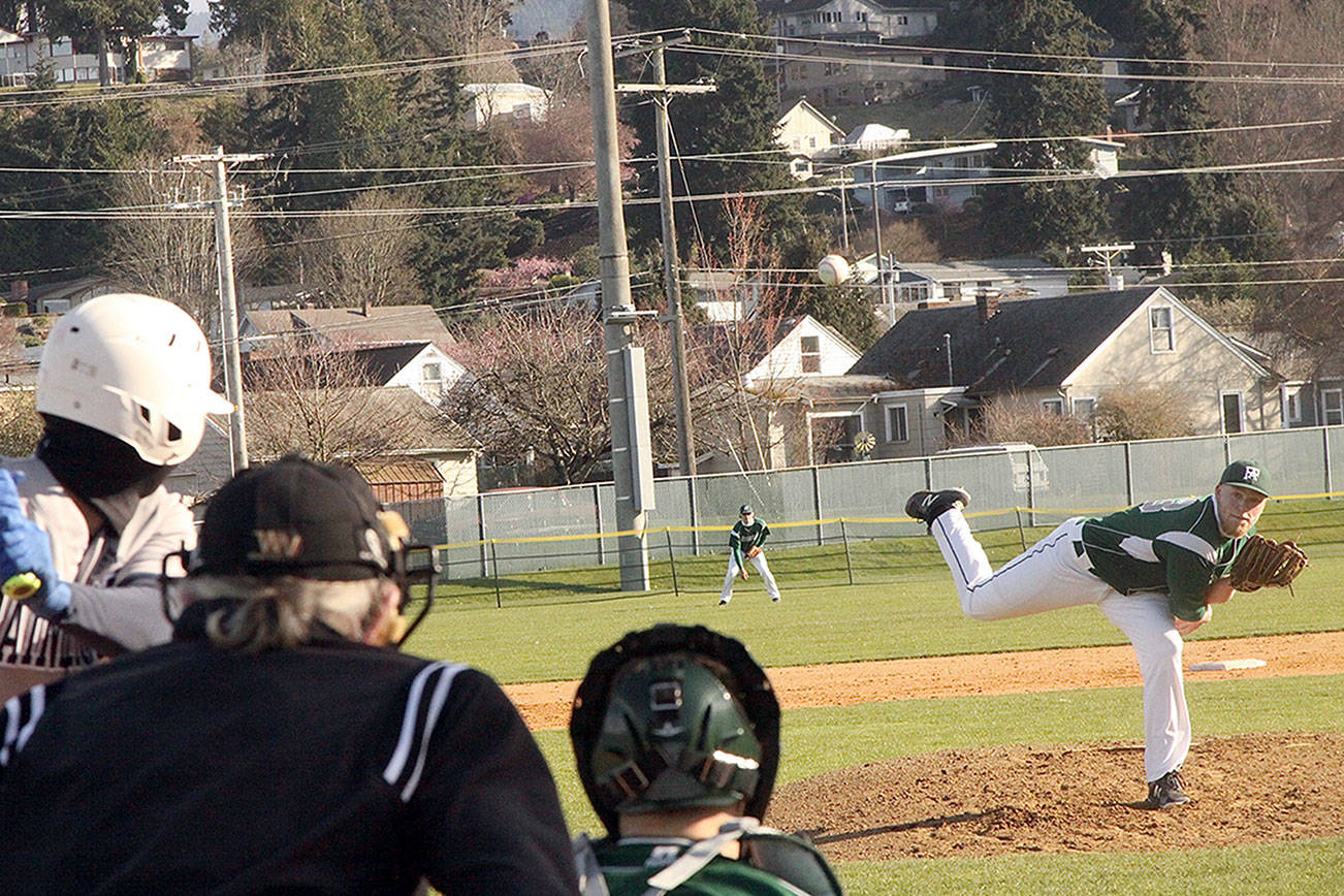 PA pitcher Adam Watkins throws a strike to a Bainbridge batter in the 3rd inning of their game. Can you see the ball?